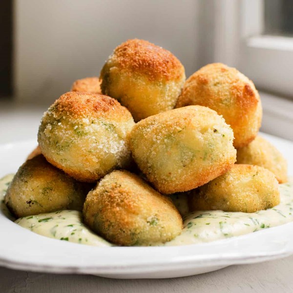 Dill and haddock fishcakes, parsley sauce