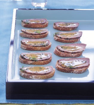 Dill-cured pork crostini with sweet mustard sauce