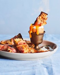 Dippy eggs with cheesy pancetta soldiers 