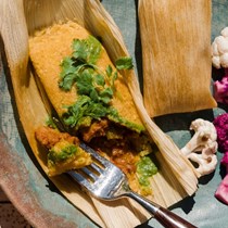 Dirty South hot tamales with jackfruit and cilantro sauce