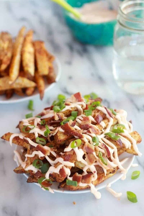 Double-baked fries with garlic cheese sauce and bacon