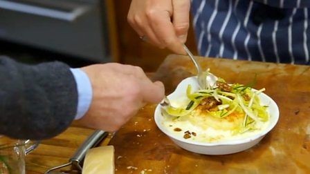 Double-baked Old Winchester soufflé with dandelion and walnut salad