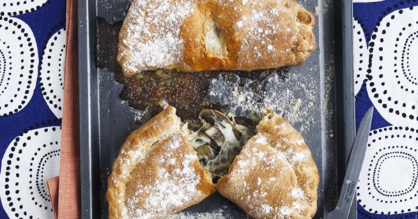 Double-cheese and mushroom calzones