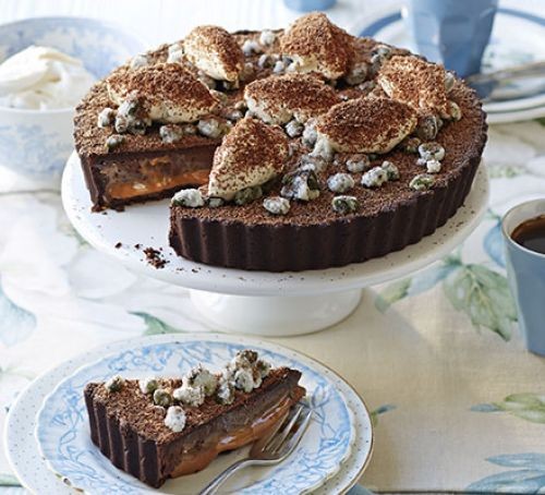 Double chocolate & caramel tart, frosted pistachios & rum cream