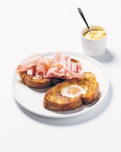Double eggy bread w shaved ham + mustard