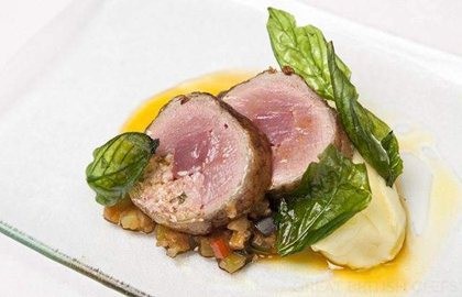 Double loin of lamb with a lemon and mint stuffing on rustic ratatouille