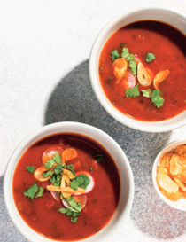 Double-tomato soup with cilantro, lime and fried garlic