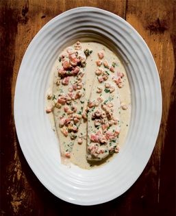 Dover sole with shrimps and tomato
