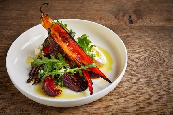 Dressed burrata with red onion, pickled plums, scorched chillies, rocket and olive oil