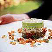 Dressed crab with spiced tomatoes and avocado puree 
