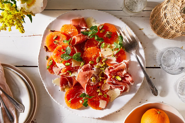 Dressed-up Cara Cara oranges with prosciutto & pistachios