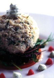 Dressed white Whitby crab meat with a plum tomato and basil salad, green herb mayonnaise, bloody Mary vinaigrette