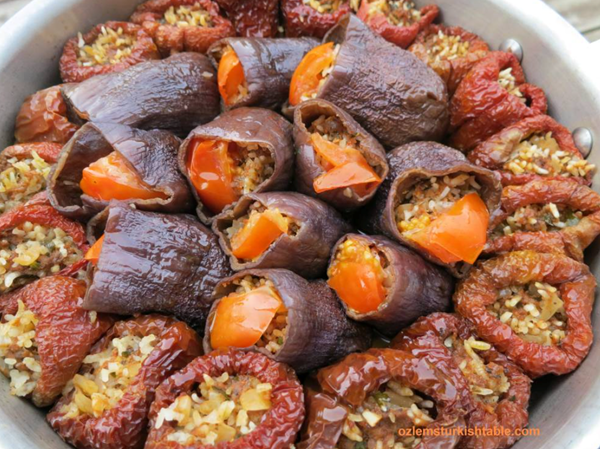 Dried aubergines/eggplants and peppers, stuffed with minced/ground meat & aromatic rice Kuru patlican ve biber dolmasi)