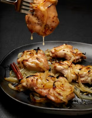 Dripping thighs - roasted chicken thighs with sweet-and-sour onions