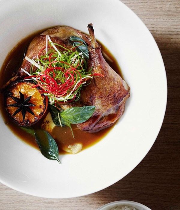 Duck braised in mandarin juice and star anise with chilli, ginger and holy basil
