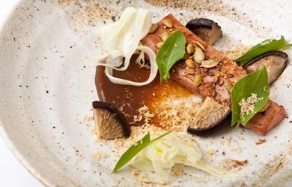 Duck breast glazed in soy with date purée, pickled shiitake, fried walnut, pumpkin seeds