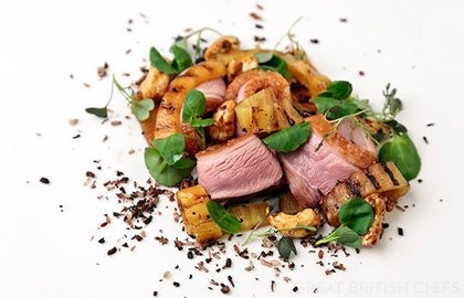 Duck breast salad with burnt coconut, pineapple and cashews