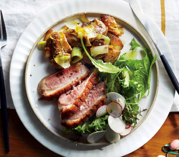 Duck breast with mustard greens, turnips, and radishes