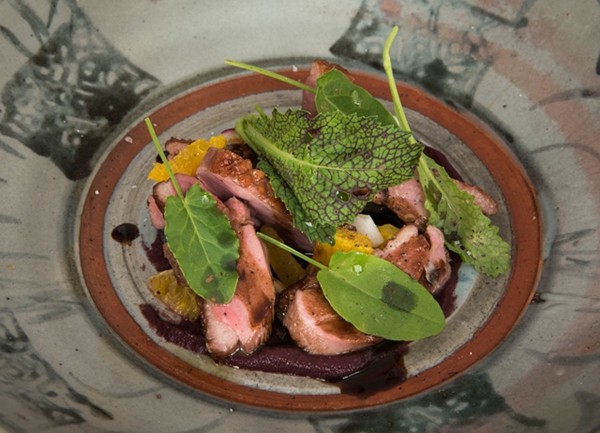 Duck breast with radicchio, orange and radishes