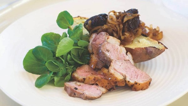 Duck breasts with dry-roasted kumara, watercress and balsamic prunes and onions