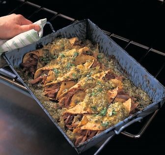 Duck confit enchiladas with green sauce