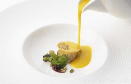 Duck confit tortellini with butternut squash velouté and soya jelly