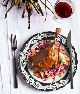 Duck confit with red cabbage, apple, & caraway vinaigrette