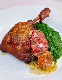 Duck confit with slow-cooked broccoli and blood orange