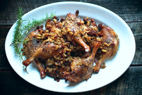 Duck confit with spicy pickled raisins