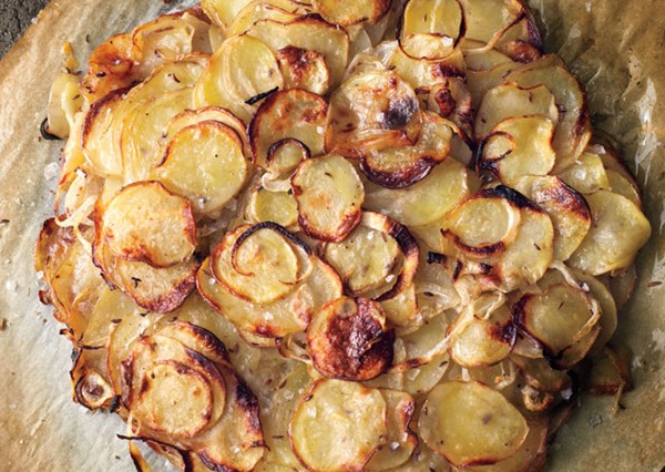 Duck fat potato galette with caraway and sweet onions