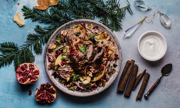 Duck fattee with chickpea pilaf, pomegranates, aubergines and walnuts