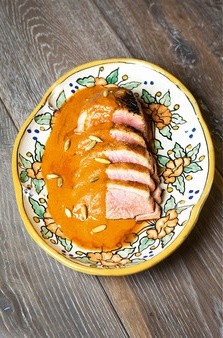 Duck in red pumpkin seed sauce (Pato en pepita roja)