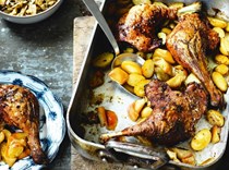 Duck legs with potatoes, apples and brown cabbage