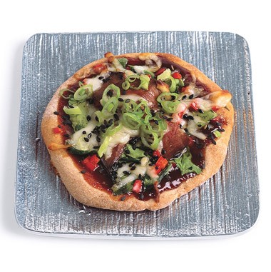 Duck pizza with hoisin and scallions