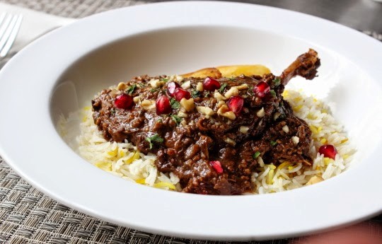 Duck stewed with pomegranate and walnuts (Fesenjan)