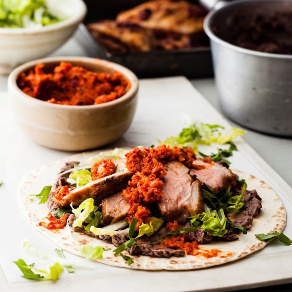 Duck tostadas with black beans & salsa