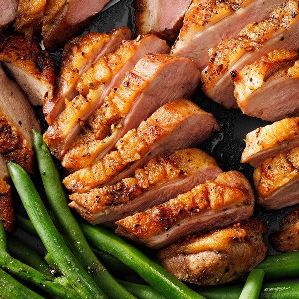 Duck with brandy Bing cherry sauce