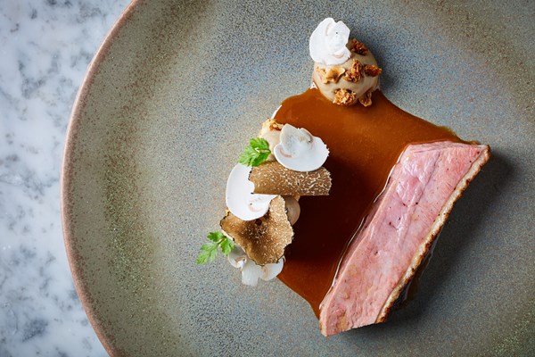 Duck with salt-baked celeriac, truffle granola and honey sauce