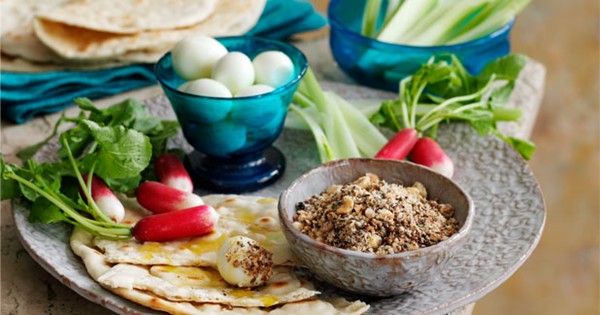 Dukkah with quail's eggs, vegetables and flatbread