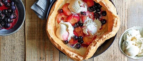Dutch baby with spiced plums