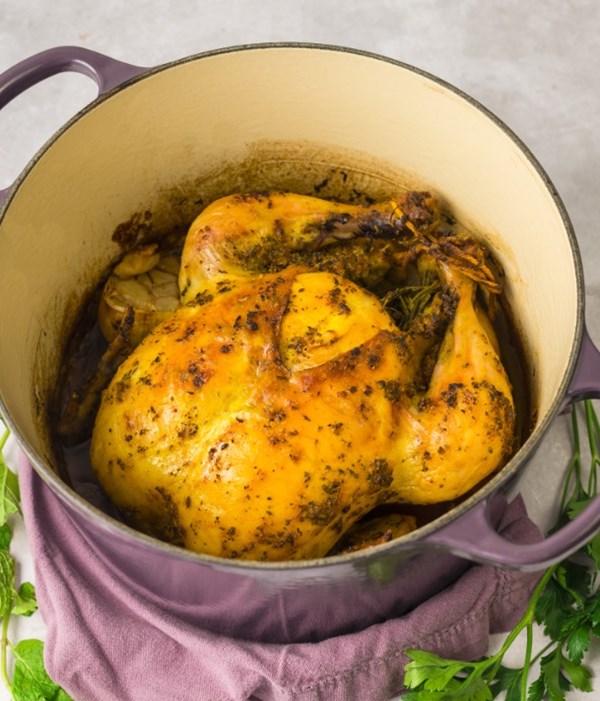 Dutch oven roast chicken with preserved lemon compound butter
