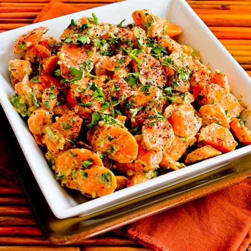 Easy and amazing barely-cooked carrots with tahini, lemon, garlic, and sumac dressing