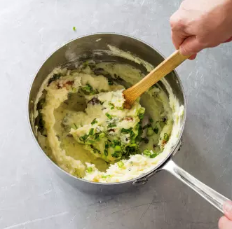 Easy mashed potatoes with bacon, blue cheese, and scallions