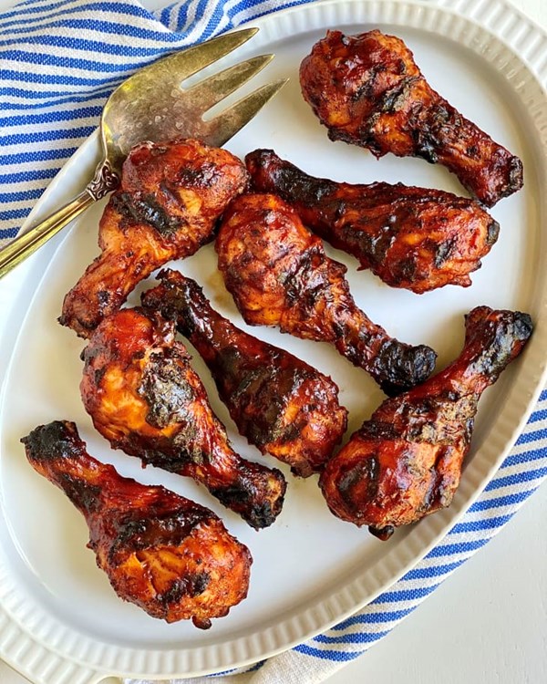 Easy spice-rubbed grilled chicken drumsticks with BBQ sauce