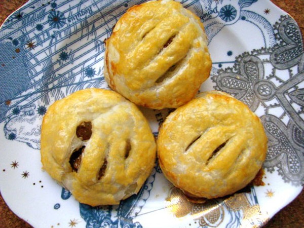 Eccles cakes (stuffed pastry with brandy-soaked raisins)