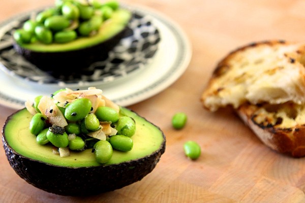 Edamame and toasted coconut in avocado
