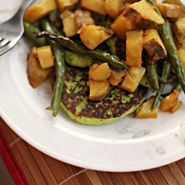 Edamame cakes with roasted sweet potatoes and green beans