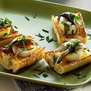 Egg and anchovy crostini