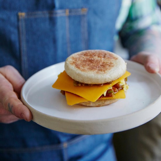 Egg-and-cheese sandwiches with scallion-tomato sauce