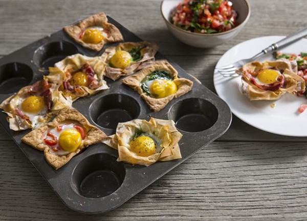 Egg cups with a spicy tomato salsa